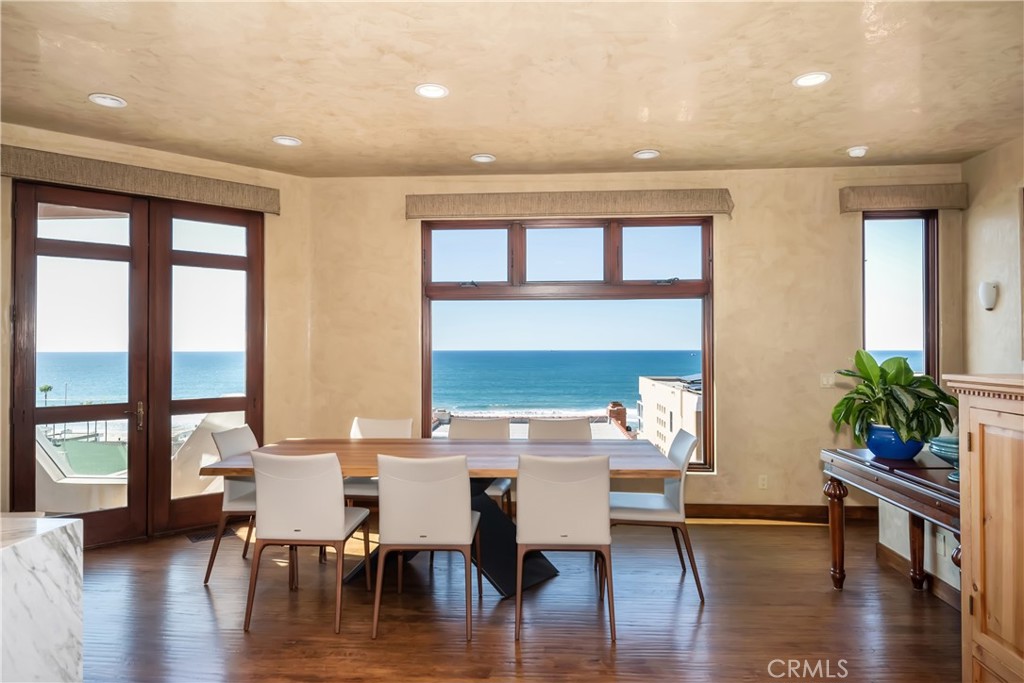 221 30th Street Manhattan Beach, CA 90266 - Photo 3 of 19 a view of a dining room with furniture window and wooden floor