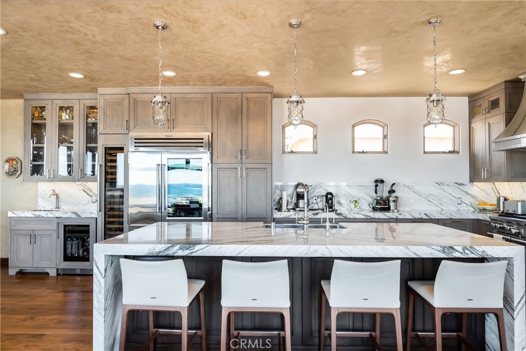 221 30th Street Manhattan Beach, CA 90266 - Photo 6 of 19 a kitchen with a table and chairs in it