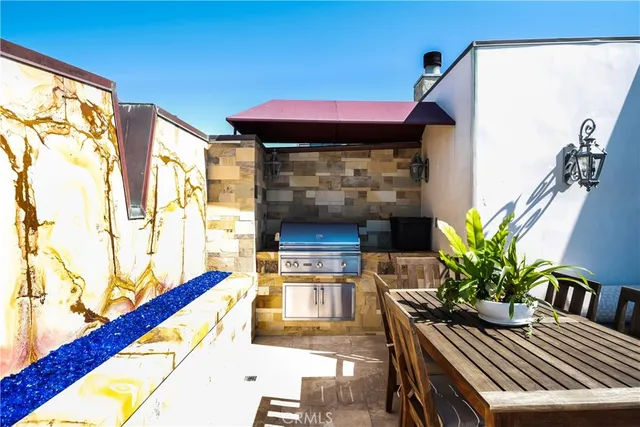 a dining room with furniture and a fireplace