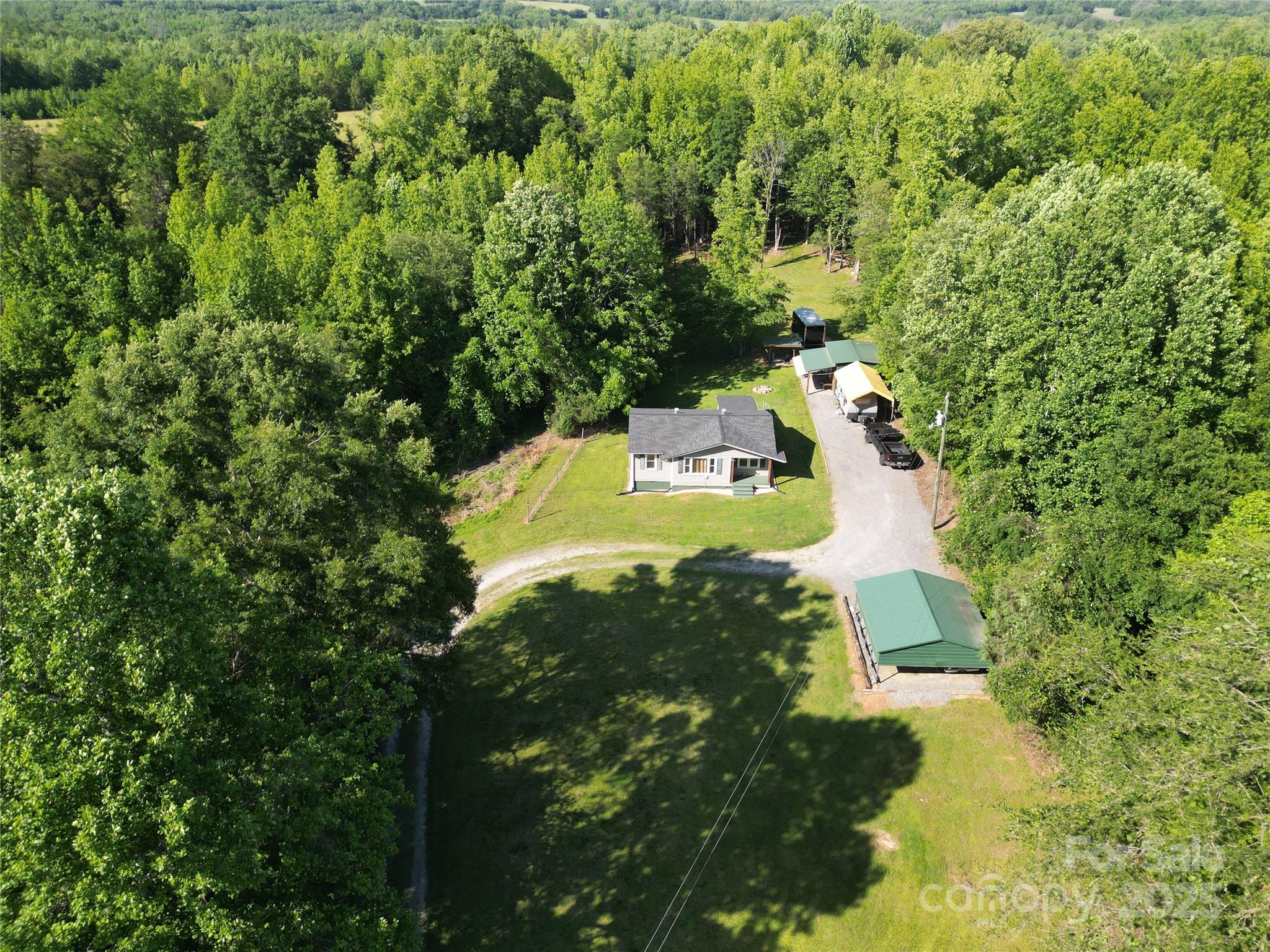 3083 State Rd S-11-54 Gaffney, SC 29340 - Photo 1 of 29 a view of a house with a yard