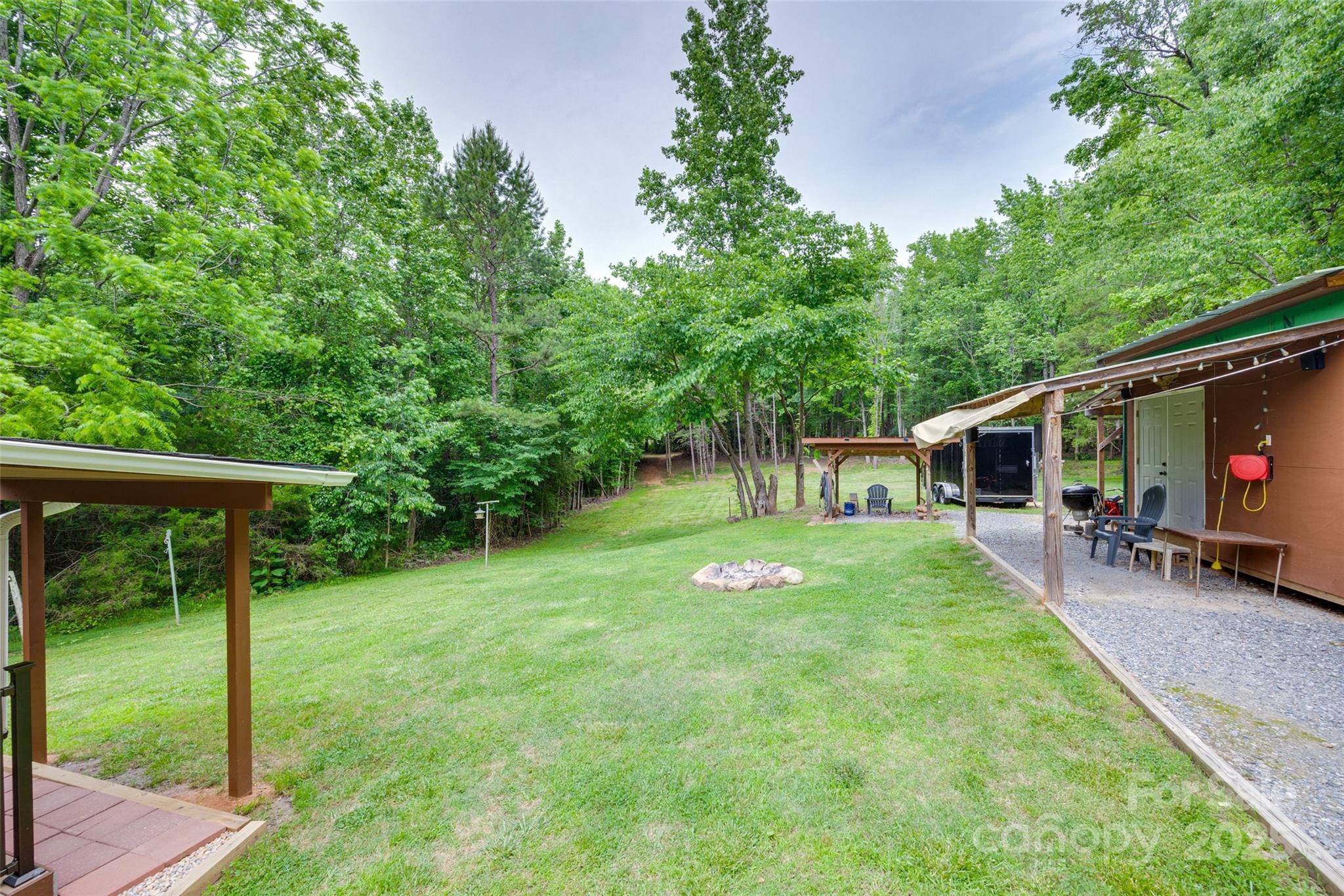 3083 State Rd S-11-54 Gaffney, SC 29340 - Photo 20 of 29 a backyard of a house with seating space