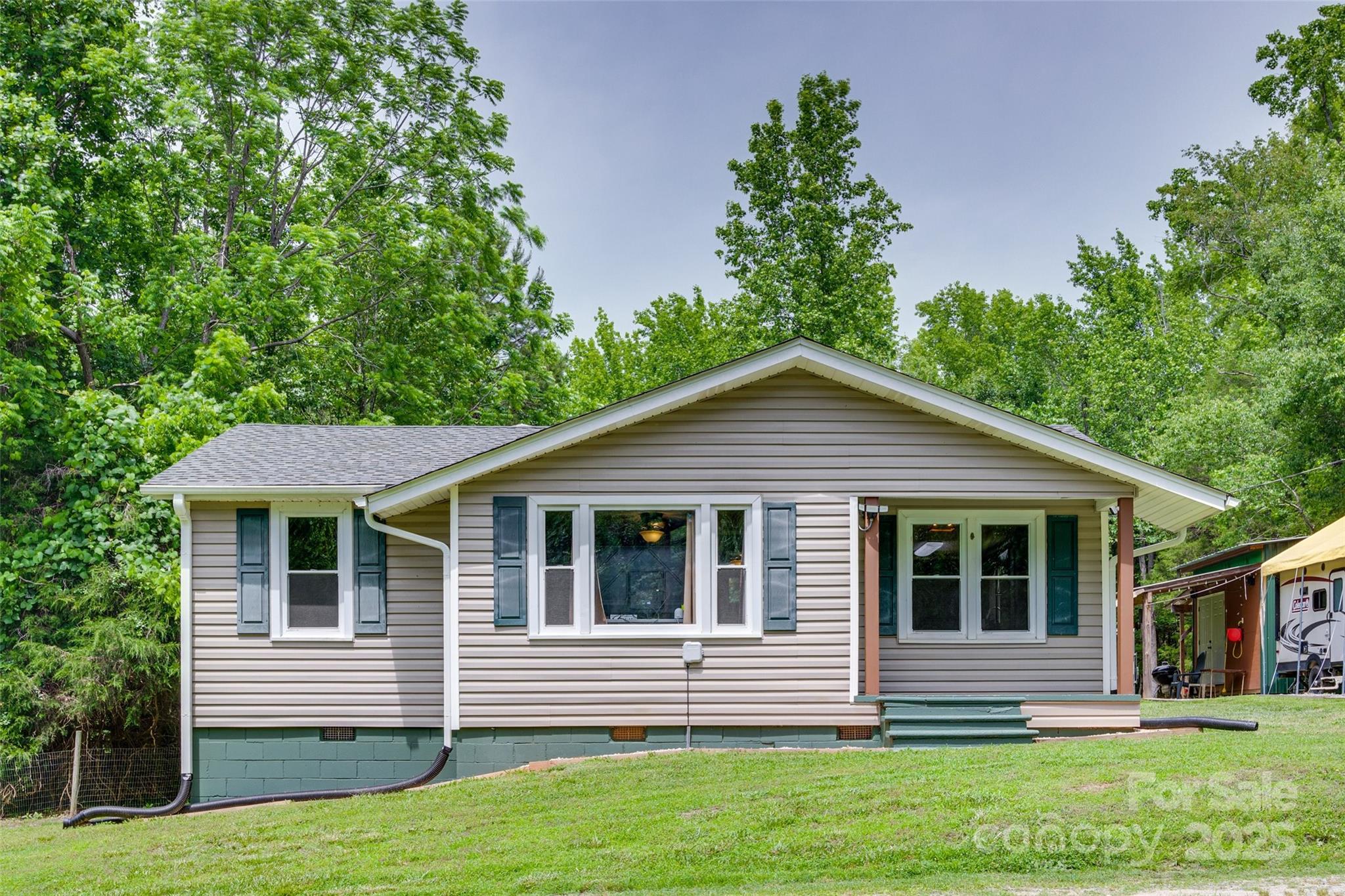 3083 State Rd S-11-54 Gaffney, SC 29340 - Photo 2 of 29 a front view of a house with a yard