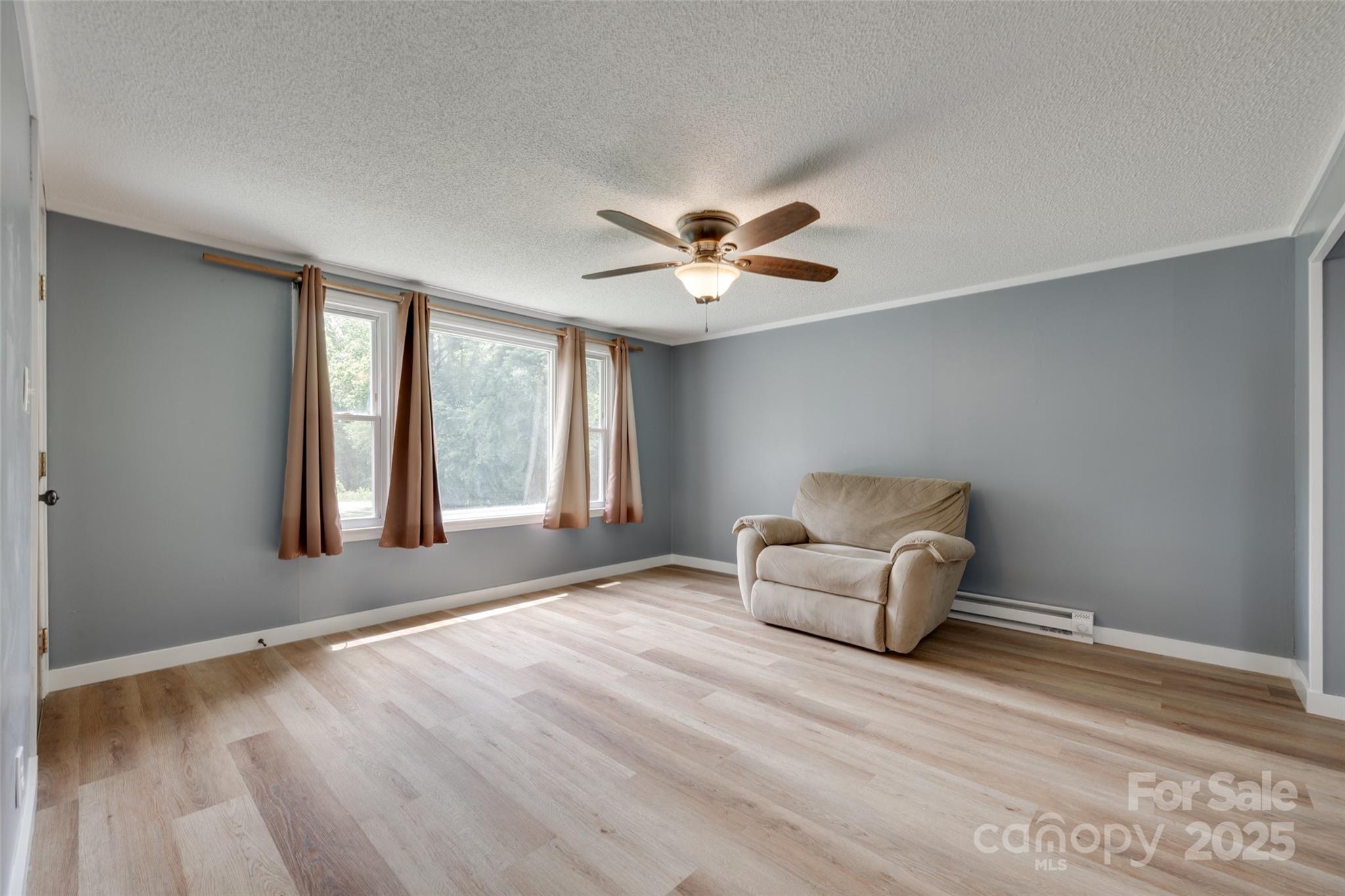 3083 State Rd S-11-54 Gaffney, SC 29340 - Photo 6 of 29 a living room with furniture and window