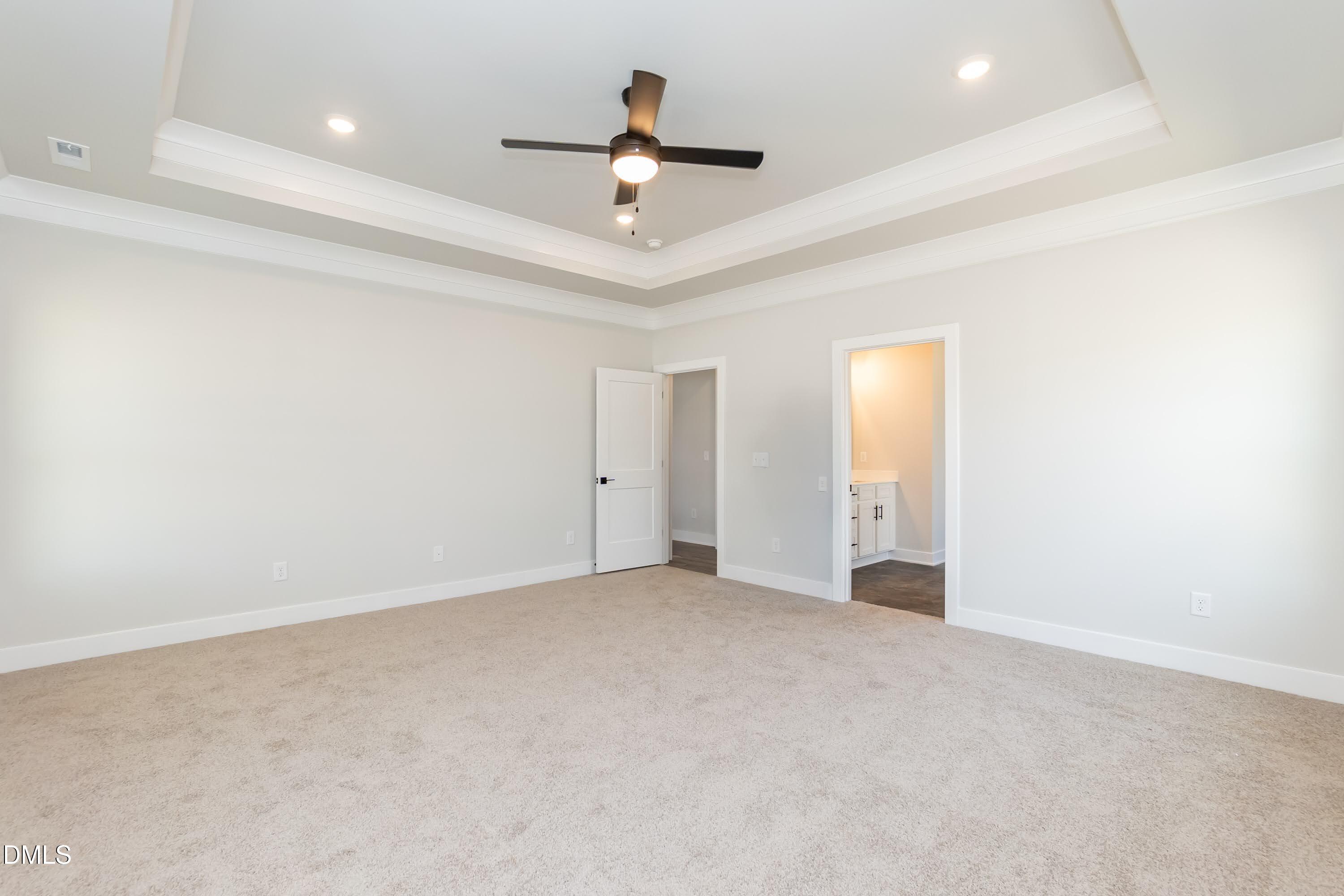 104 Galway Road Lillington, NC 27546 - Photo 21 of 40 an empty room with ceiling fan and window