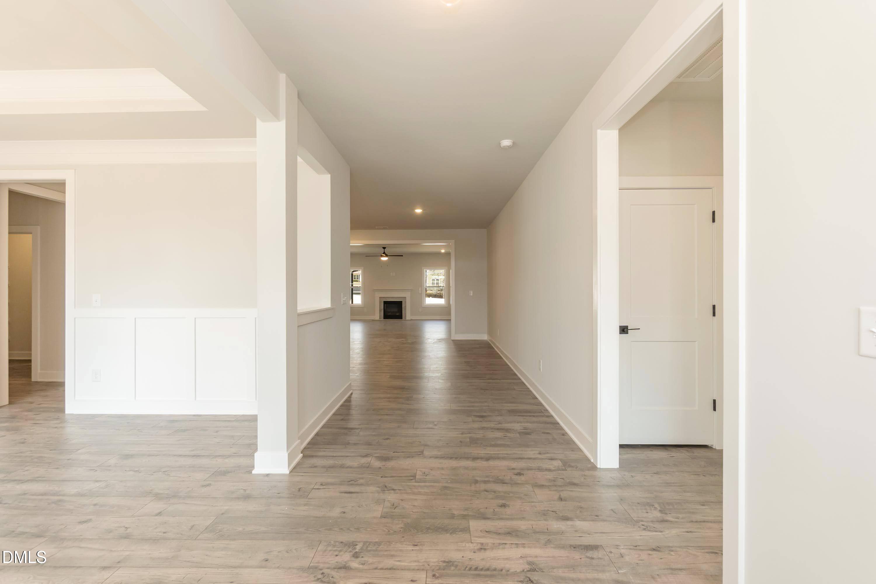 104 Galway Road Lillington, NC 27546 - Photo 8 of 40 a view of a hallway with wooden floor