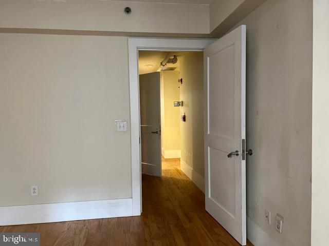 1615 Walnut Street, Unit 4 Philadelphia, PA 19102 - Photo 12 of 22 a view of a hallway with wooden floor