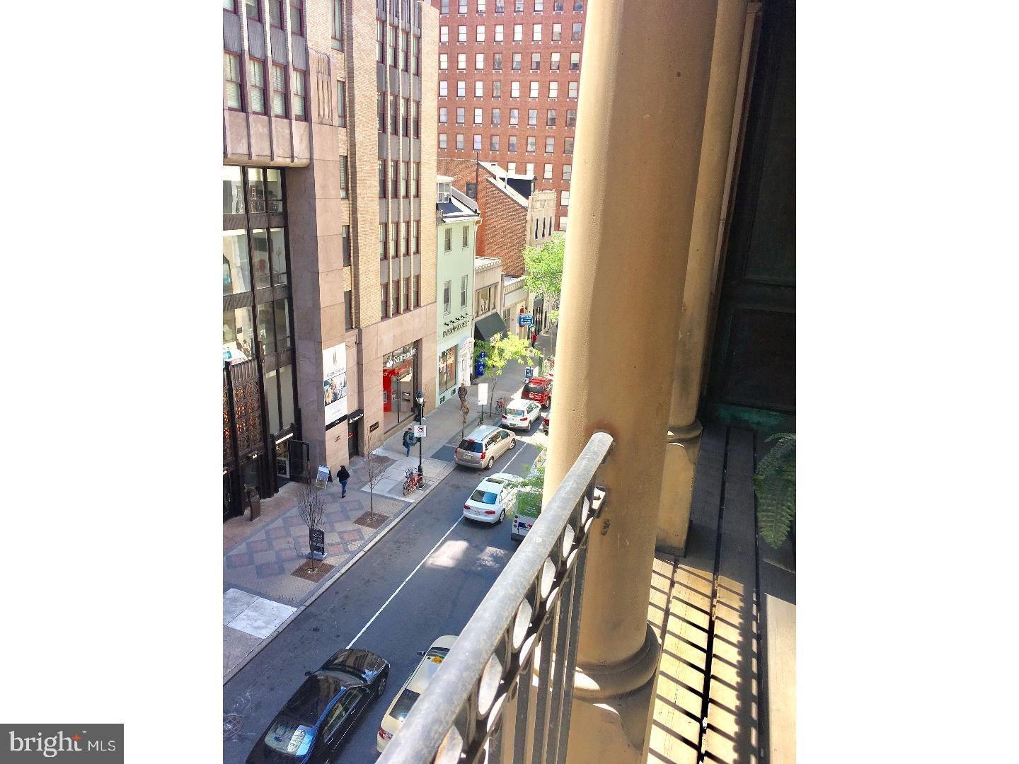 1615 Walnut Street, Unit 4 Philadelphia, PA 19102 - Photo 14 of 22 a view of a balcony with wooden floor