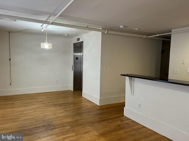 1615 Walnut Street, Unit 4 Philadelphia, PA 19102 - Photo 3 of 22 a view of empty room with wooden floor