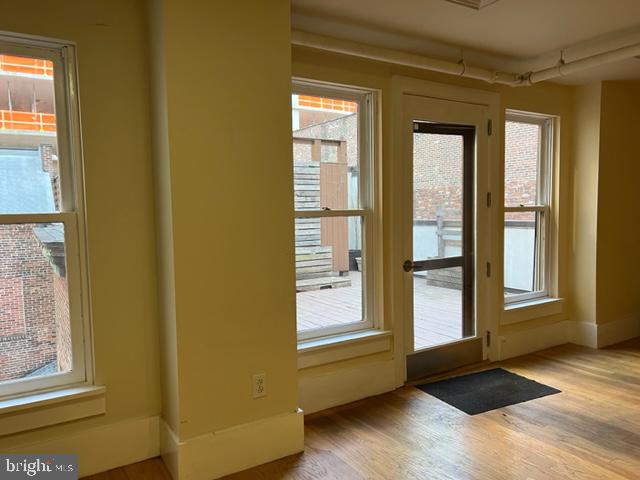 1615 Walnut Street, Unit 4 Philadelphia, PA 19102 - Photo 6 of 22 a view of an empty room and a window