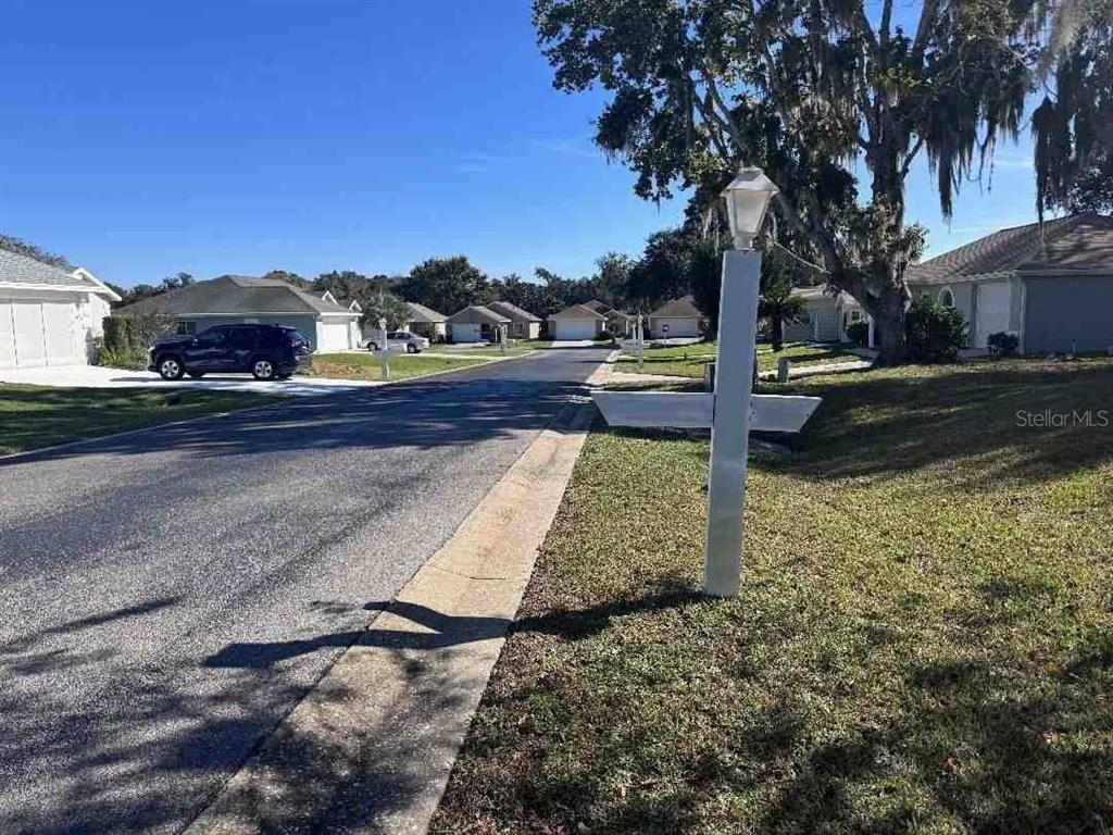 5110 Northwest 19th Place Ocala, FL 34482 - Photo 5 of 9 a sign board with street view