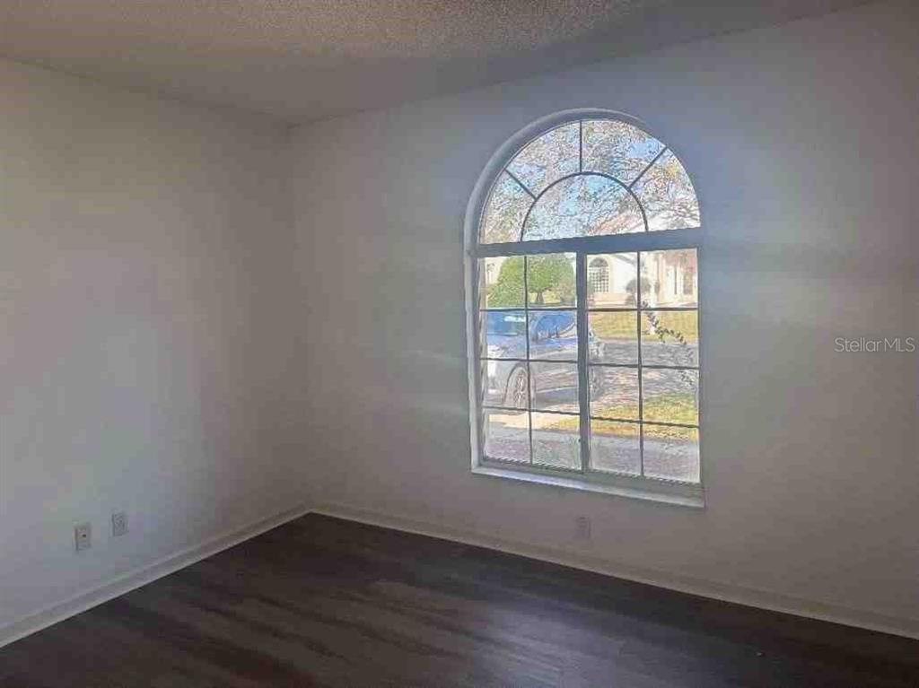 5110 Northwest 19th Place Ocala, FL 34482 - Photo 8 of 9 an empty room with a window
