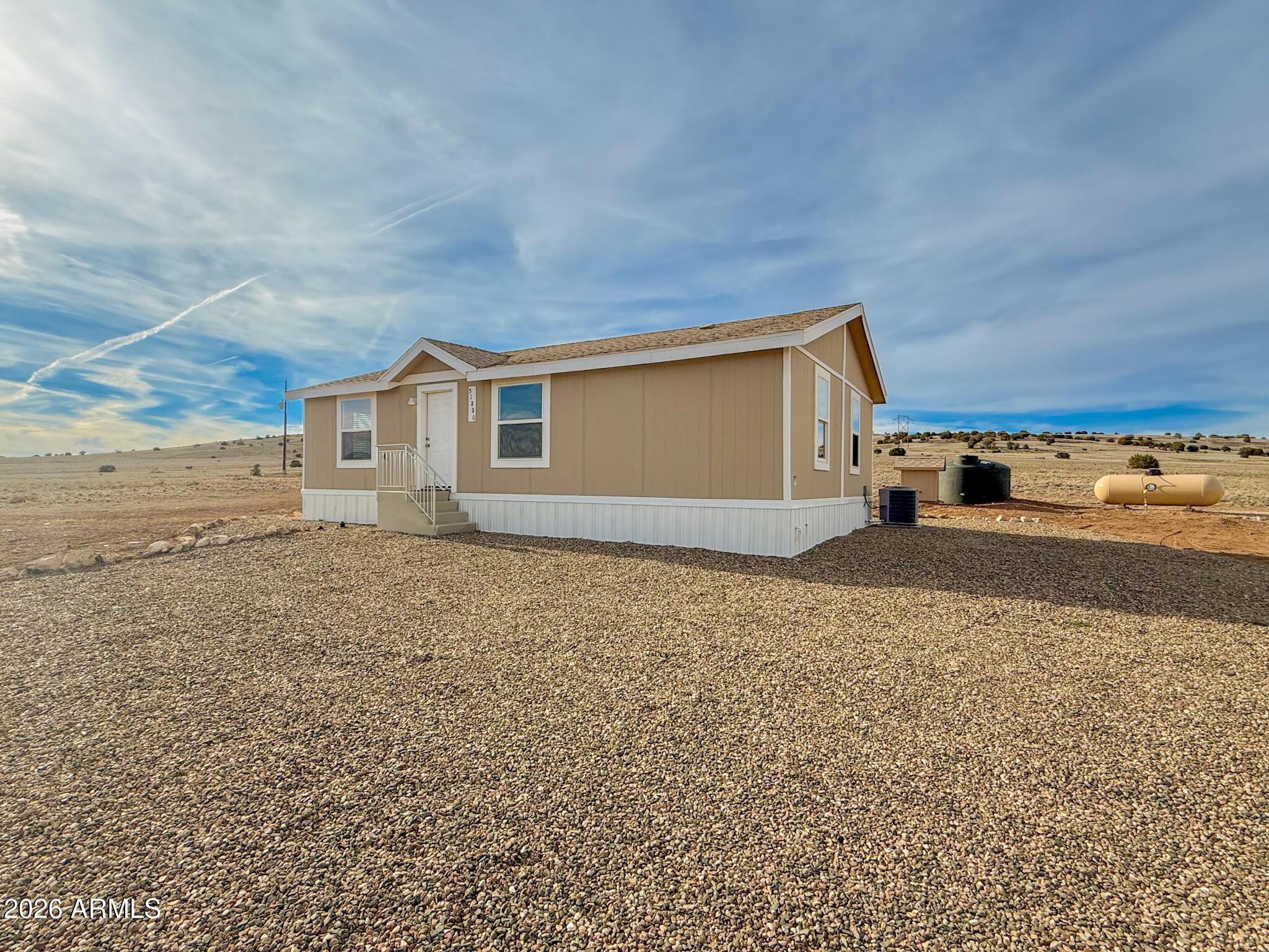 51880 North Gold Plains Road Seligman, AZ 86337 - Photo 1 of 24 a view of a house with a yard
