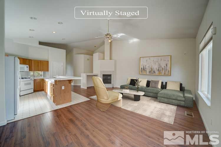 7560 Michaela Drive Reno, NV 89511 - Photo 2 of 32 a living room with furniture wooden floor and a chandelier
