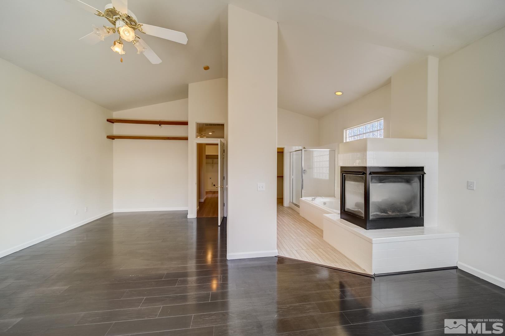 7560 Michaela Drive Reno, NV 89511 - Photo 25 of 32 a view of a kitchen with a sink and a stove top oven