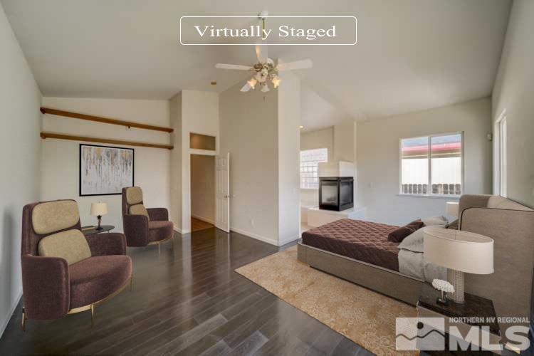 7560 Michaela Drive Reno, NV 89511 - Photo 3 of 32 a living room with furniture and wooden floor
