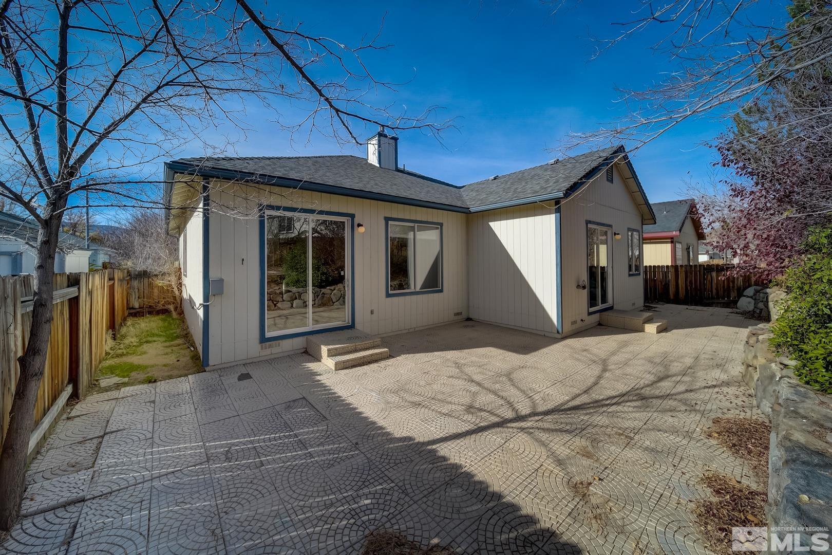 7560 Michaela Drive Reno, NV 89511 - Photo 32 of 32 a front view of a house with a yard