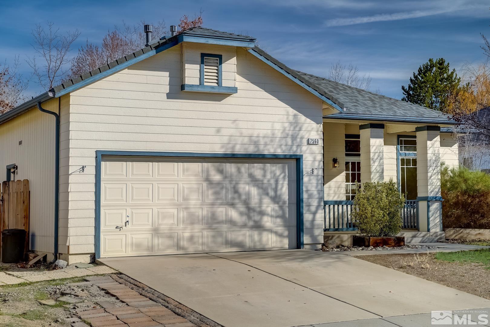 7560 Michaela Drive Reno, NV 89511 - Photo 10 of 32 a view of a house with a garden