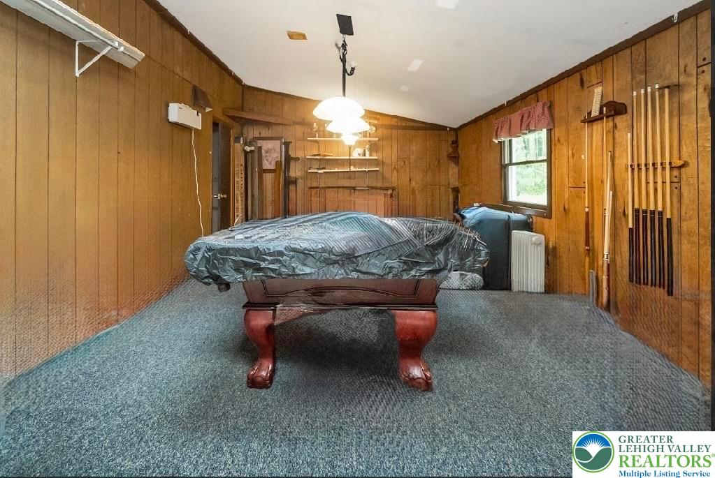 9223 North Loop Road Slatington, PA 18080 - Photo 47 of 60 a bed room with a bed window and table