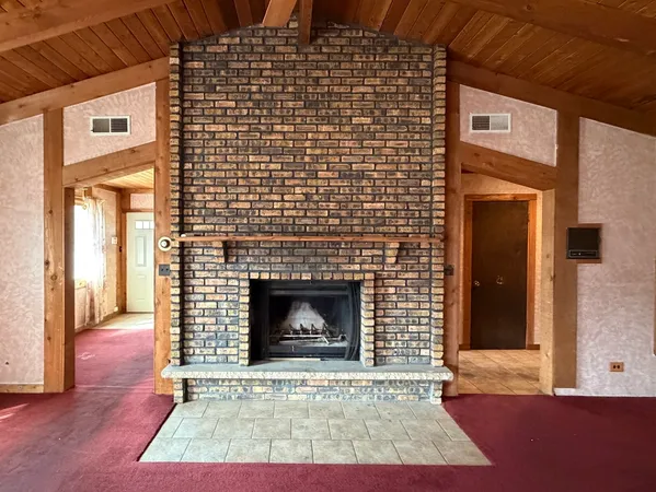 a living room with a fireplace