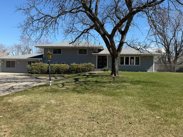 a front view of house with yard