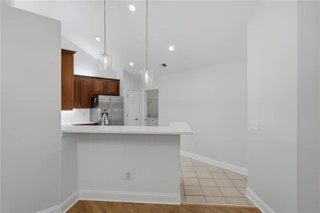 a view of a kitchen with a sink