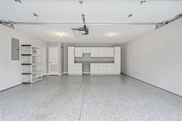 a view of a livingroom with a furniture and a ceiling fan