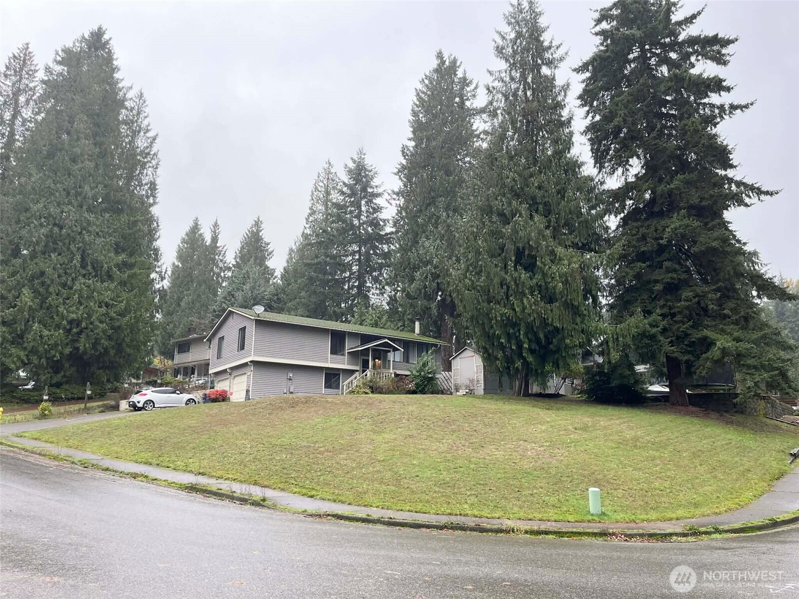 156 South 358th Street Federal Way, WA 98003 - Photo 2 of 35 a view of house with outdoor space