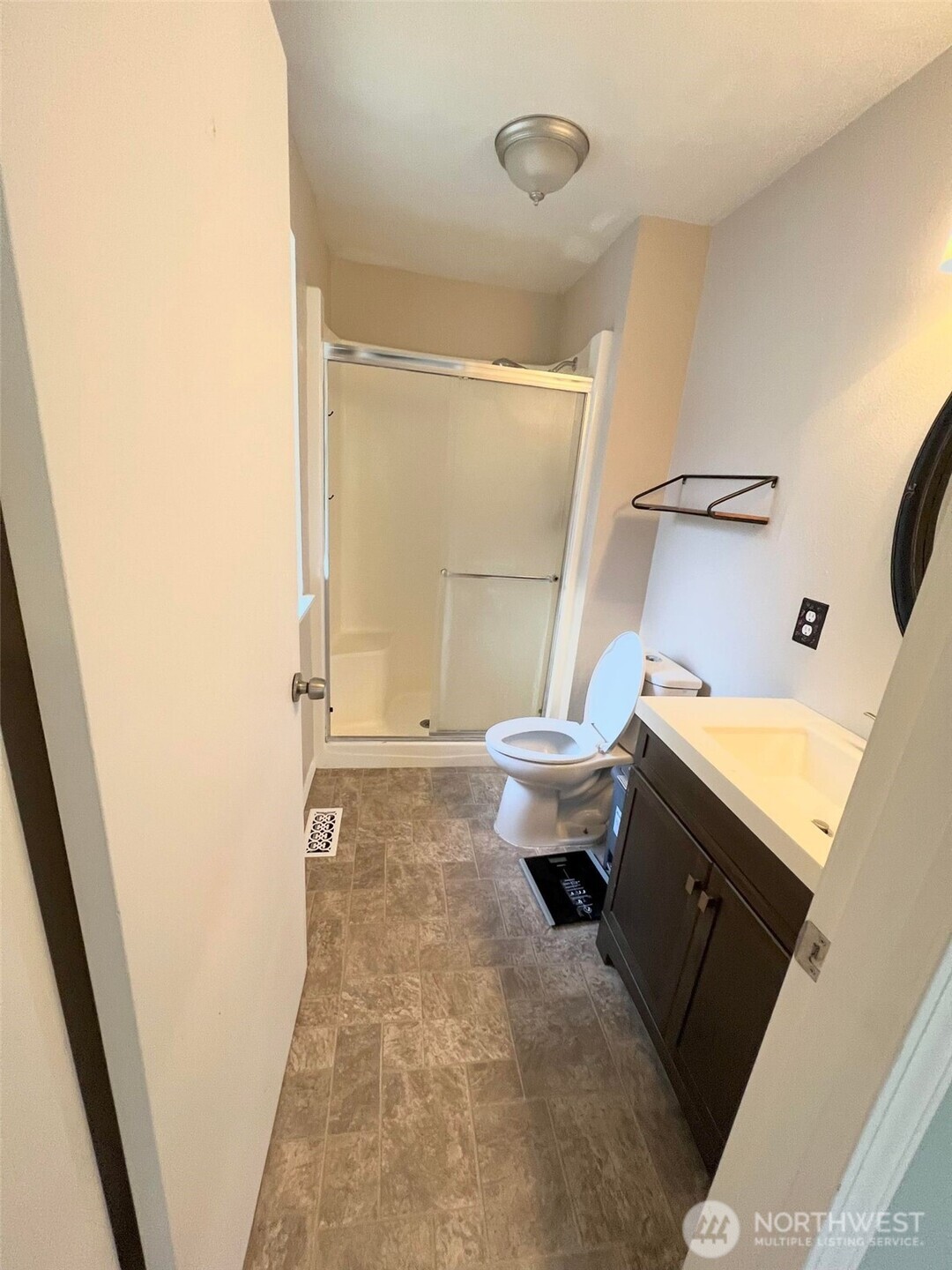 156 South 358th Street Federal Way, WA 98003 - Photo 34 of 35 a bathroom with a sink and mirror