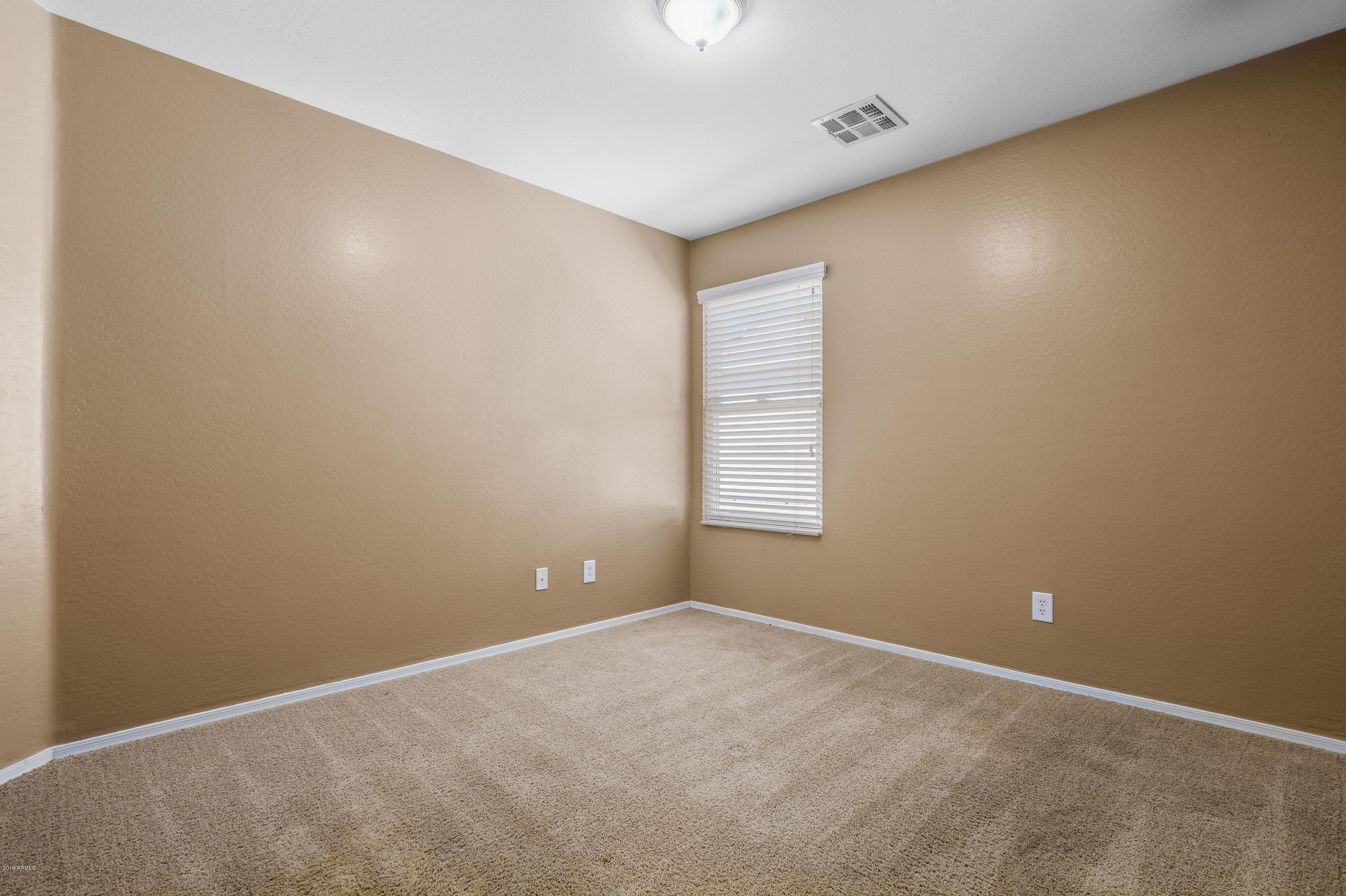 2234 East Fraktur Road Phoenix, AZ 85040 - Photo 18 of 27 Roomy bedroom