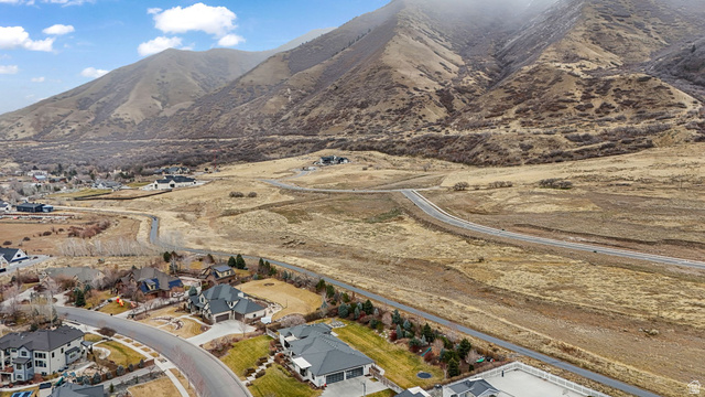 2116 South Valley View Drive, Unit 58 Mapleton, UT 84664 - Photo 6 of 13 Aerial perspective of suburban area with a mountainous background