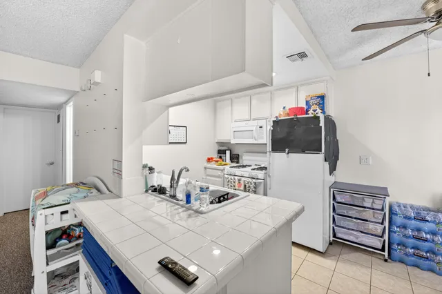 $230,000 | 48304 Stewart Drive, Unit J1, Indio, CA 92201