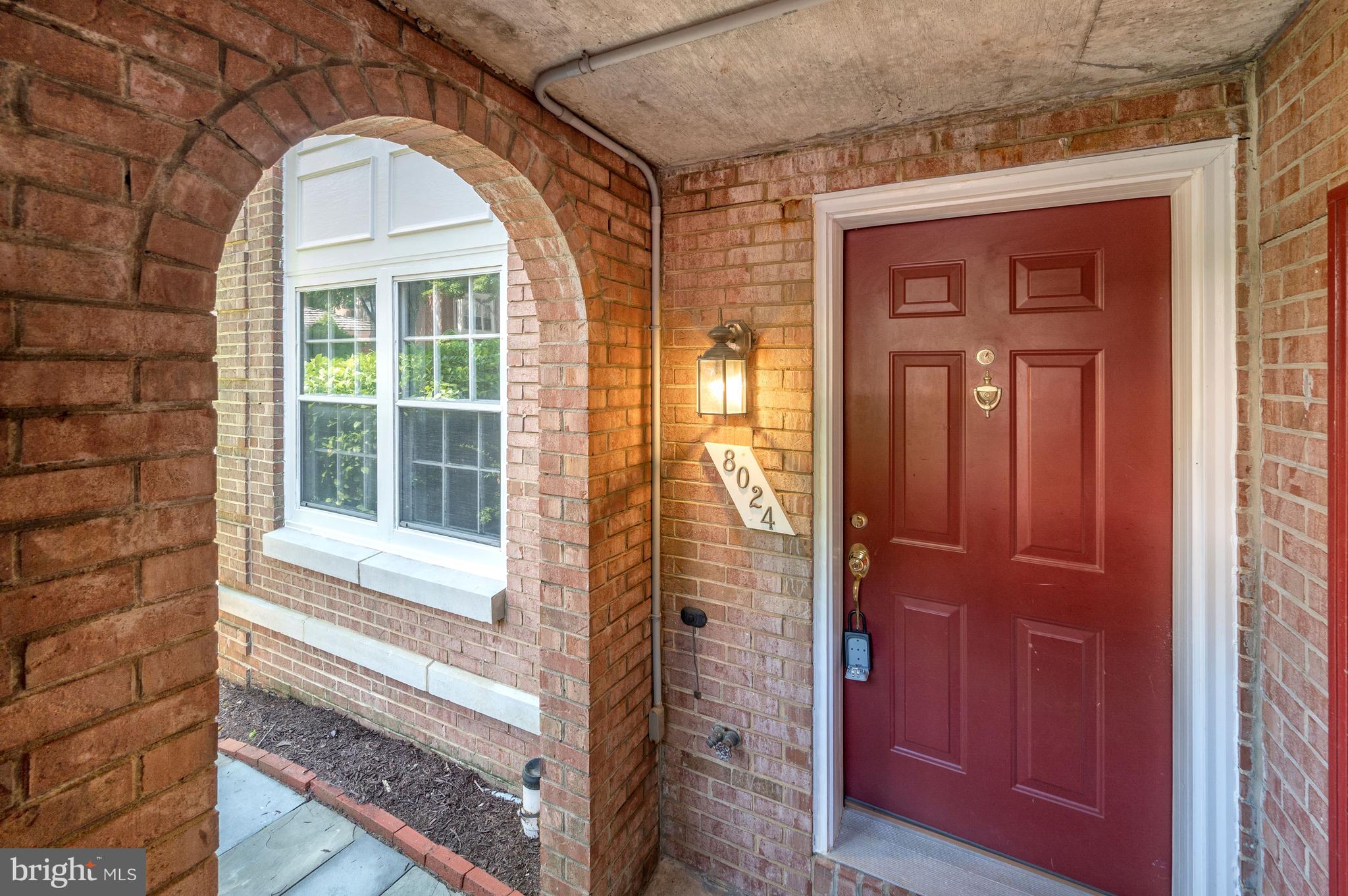 8024 Quarry Ridge Way, Unit 1B Bethesda, MD 20817 - Photo 3 of 16 Brick front