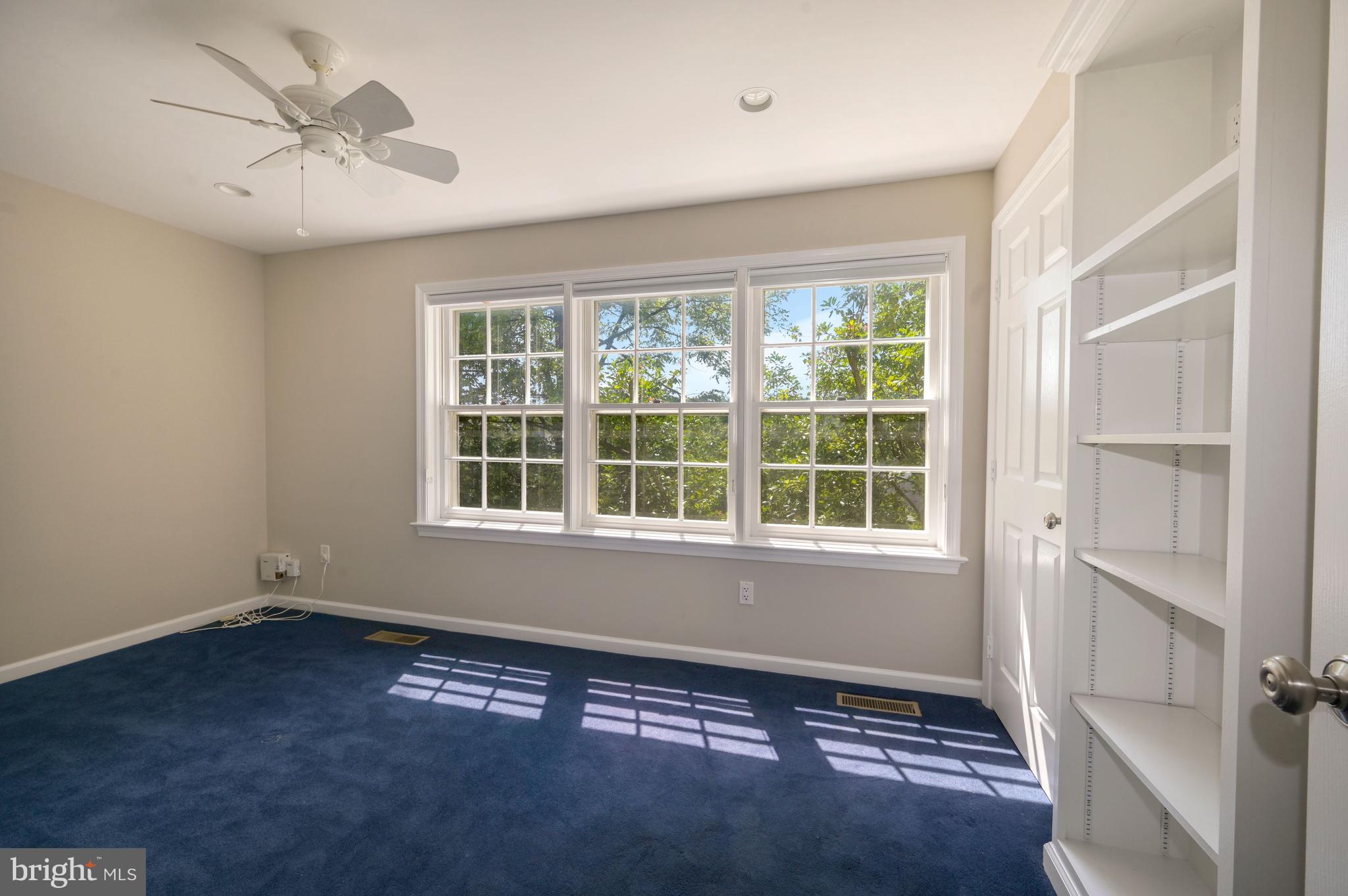 8024 Quarry Ridge Way, Unit 1B Bethesda, MD 20817 - Photo 8 of 16 Bedroom 2 w/ trio of windows for plenty of light