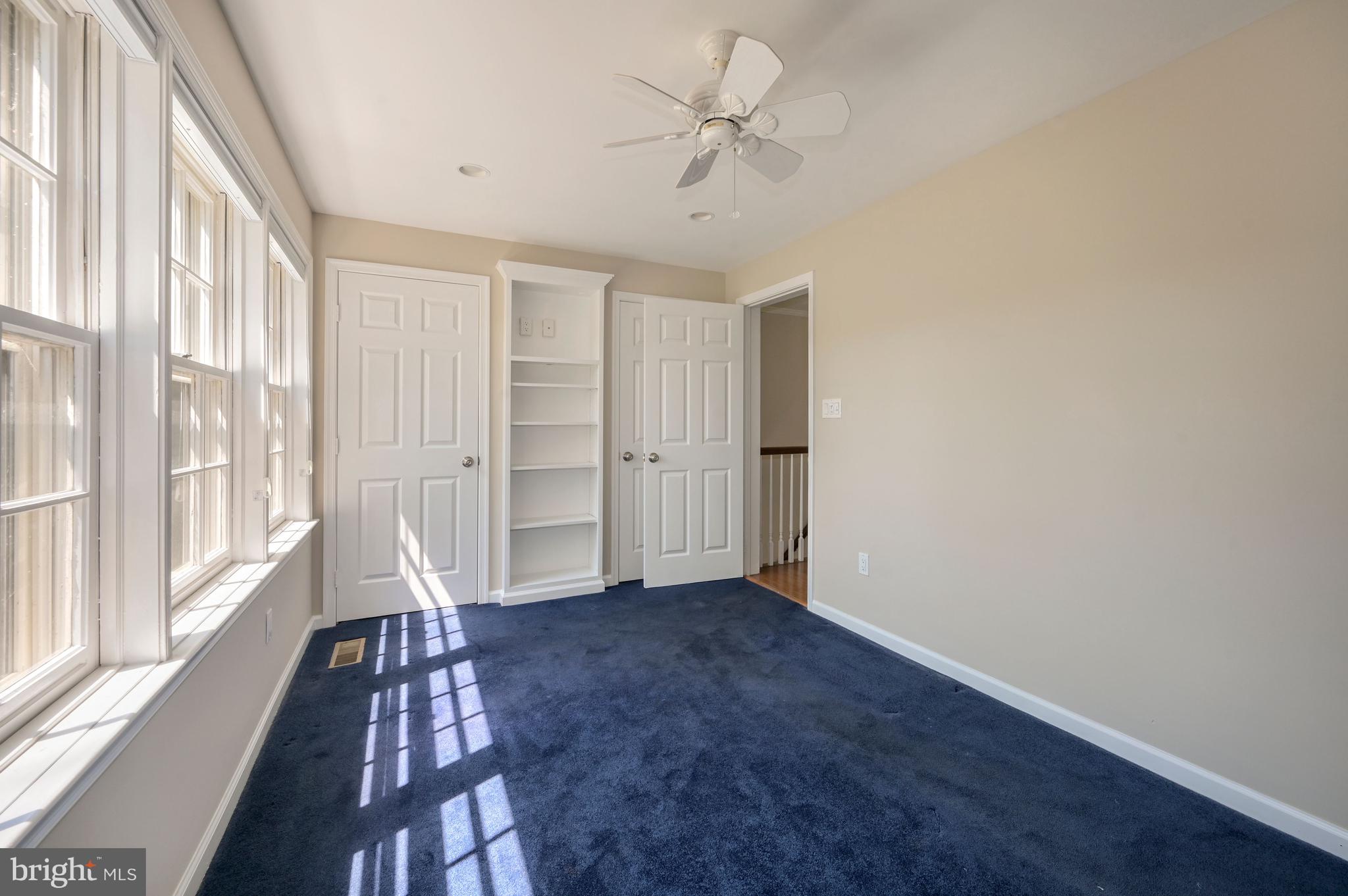 8024 Quarry Ridge Way, Unit 1B Bethesda, MD 20817 - Photo 9 of 16 Bedroom 2 has additional shelving for storage
