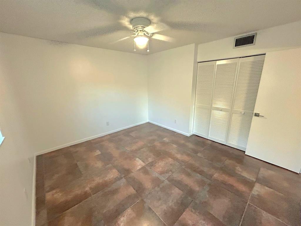 4147 Northwest 90th Avenue, Unit 206 Coral Springs, FL 33065 - Photo 25 of 37 a view of an empty room