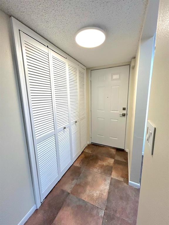 4147 Northwest 90th Avenue, Unit 206 Coral Springs, FL 33065 - Photo 30 of 37 a view of a room with door