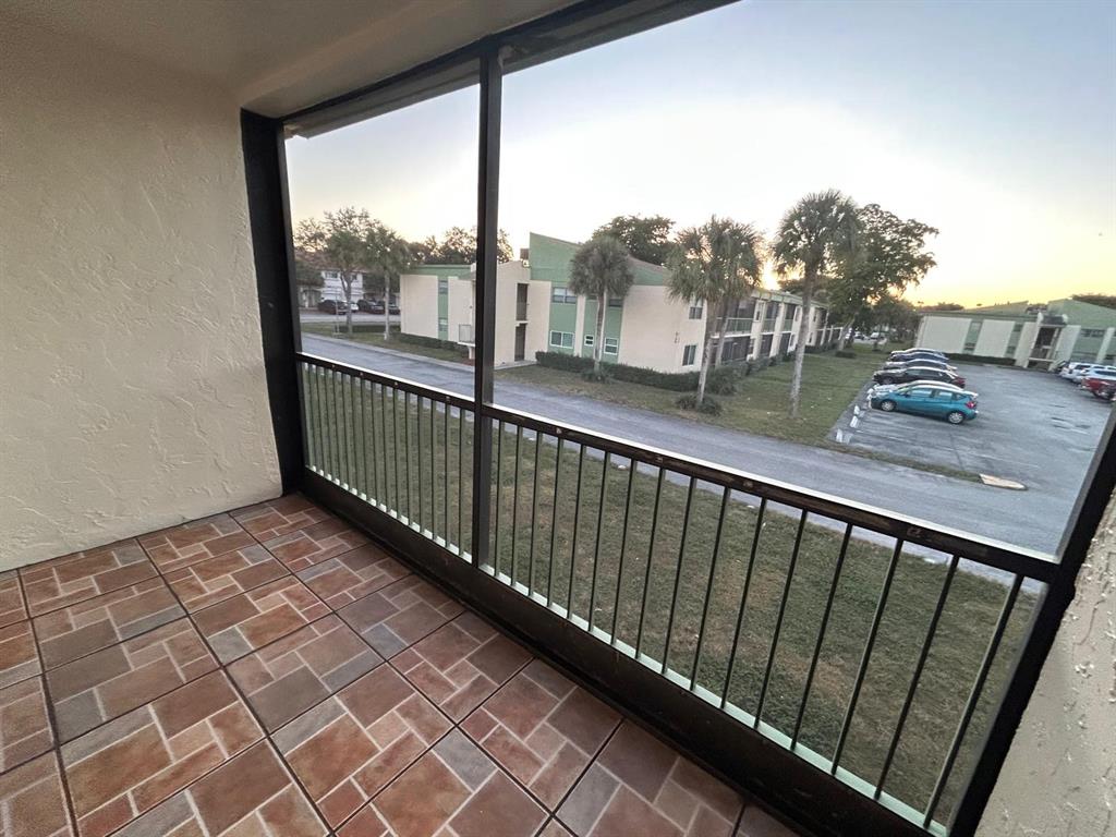 4147 Northwest 90th Avenue, Unit 206 Coral Springs, FL 33065 - Photo 33 of 37 a view of a street view from a balcony