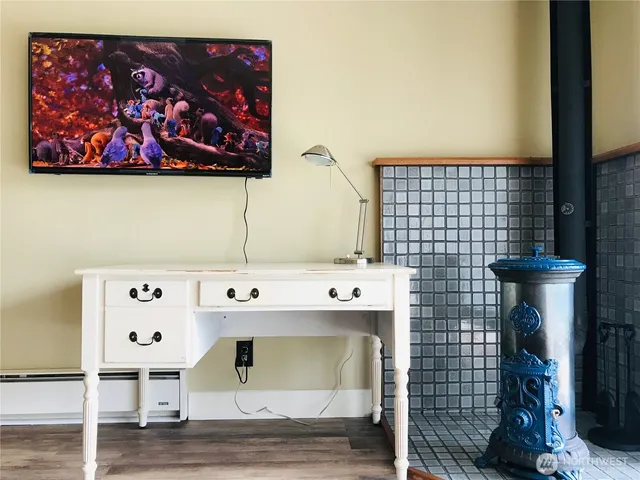 a bathroom with a sink and mirror