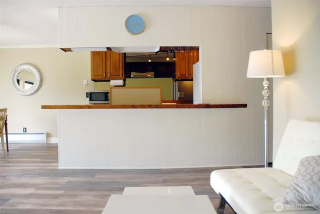 a bathroom with a sink mirror vanity and toilet