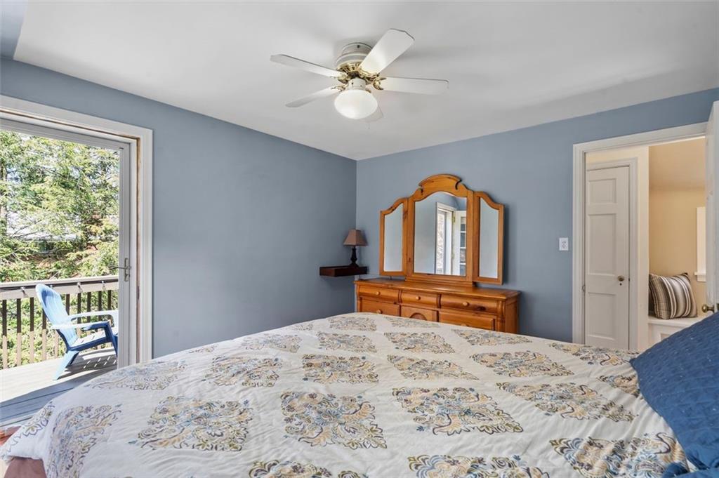 424 Thompson Run Road Pittsburgh, PA 15237 - Photo 16 of 31 a bedroom with a bed and a large window with outer view