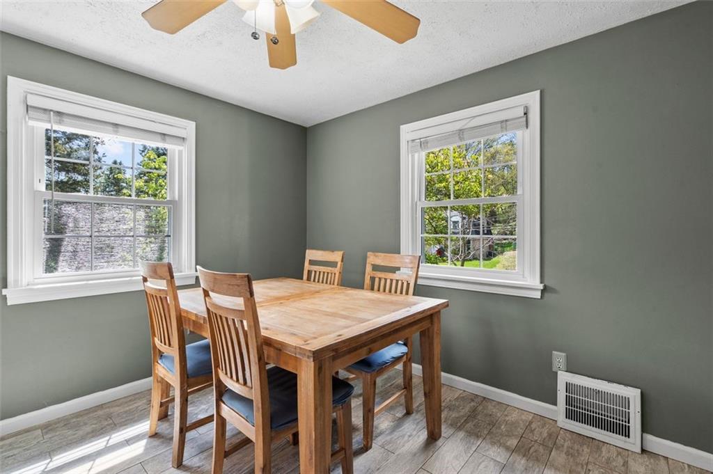 424 Thompson Run Road Pittsburgh, PA 15237 - Photo 9 of 31 a dining room with furniture and window