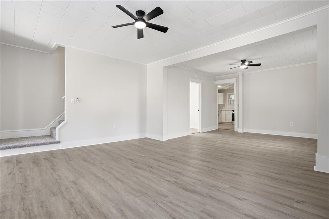 110 Messinger Street Bangor, PA 18013 - Photo 4 of 39 A spacious living area with resilient vinyl flooring and convenient interior access to the kitchen.