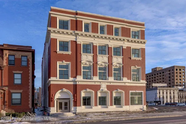 a front view of a multi story building