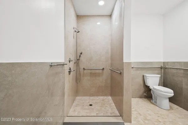 a bathroom with a sink and a shower