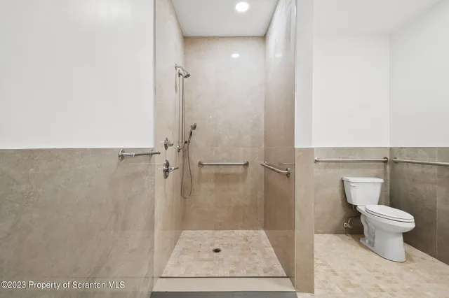 a bathroom with a sink and a shower