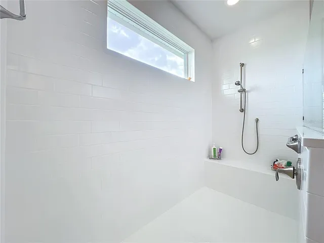 a view of a chairs and table in the patio