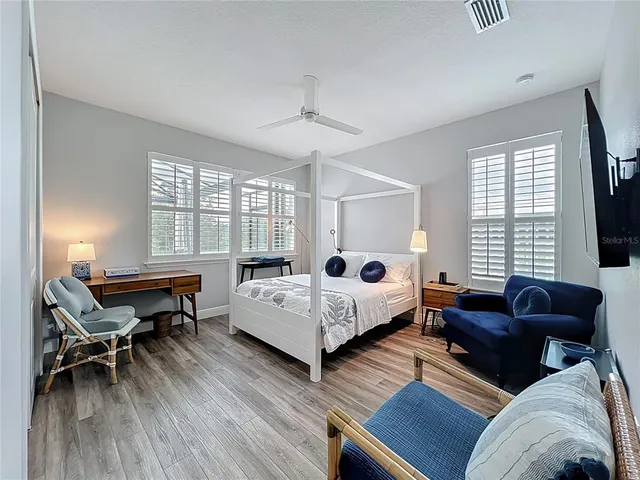 a bathroom with a sink and a large window