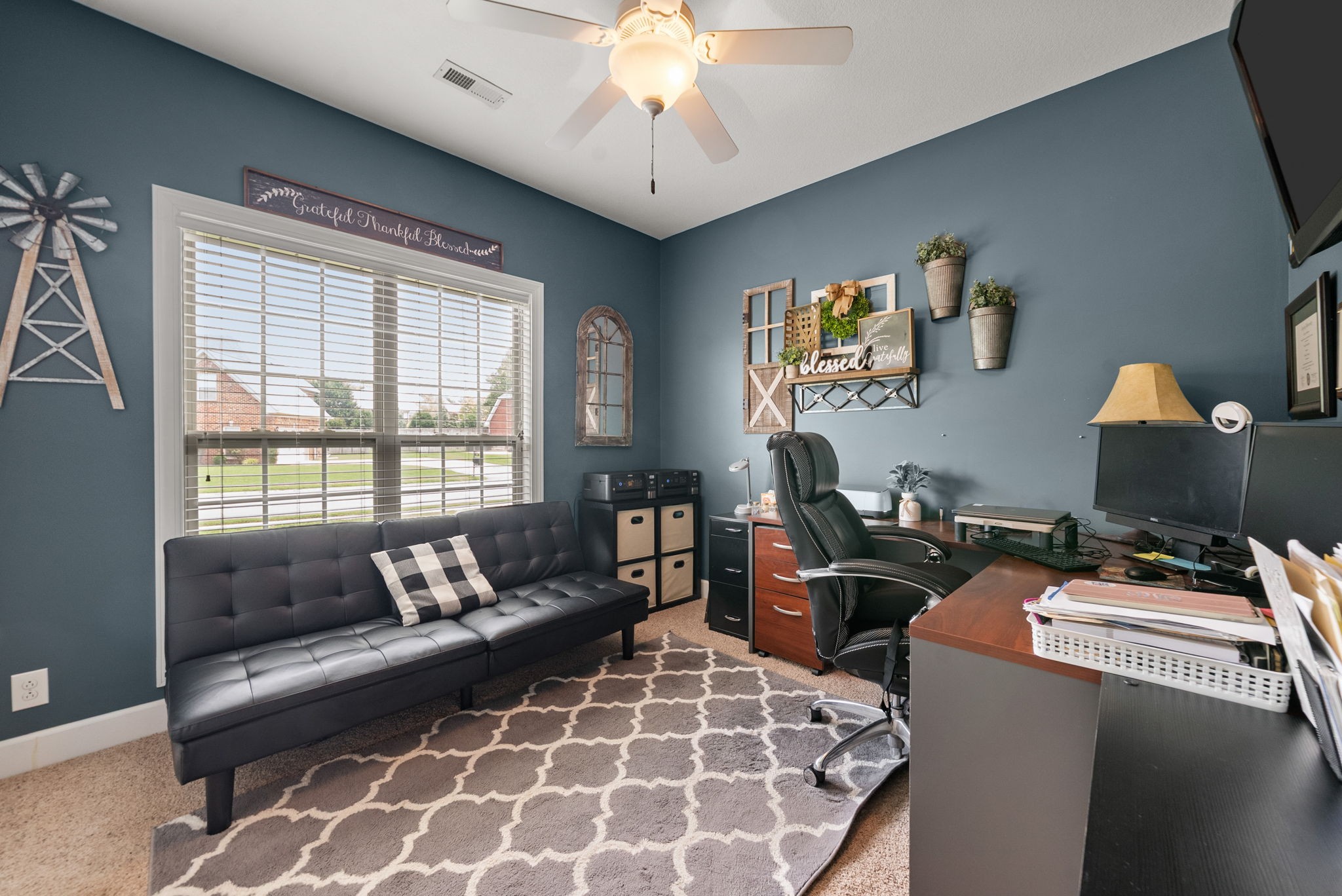 1192 Wicke Road Adams, TN 37010 - Photo 36 of 45 a living room with furniture and a chandelier