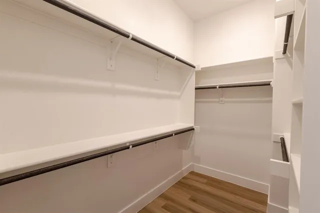a view of an empty walk in closet