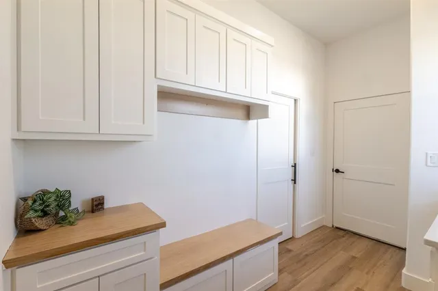 a kitchen with appliances and cabinets